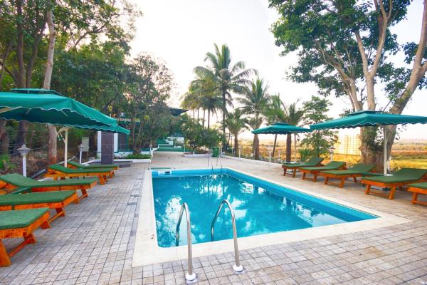 The Herb Farm Managed by The Grand Ashoka, Réserver  Hôtels à Maharashtra avec piscine, Piscine