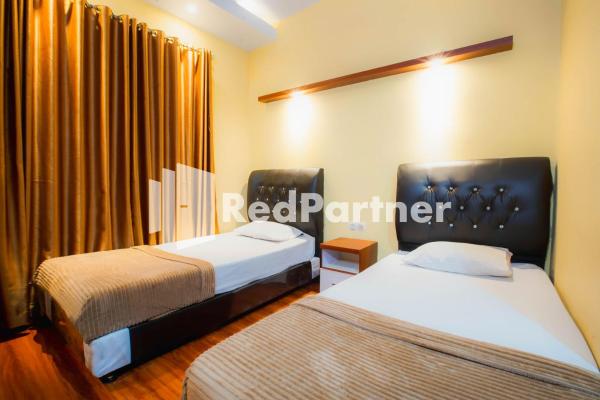 Hatta Guest House, Buchen Sie Pension Jambi Jambi