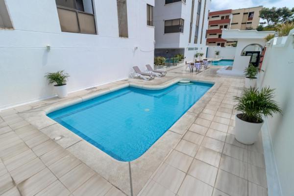 Hotel Axis Inn By GEH Suites