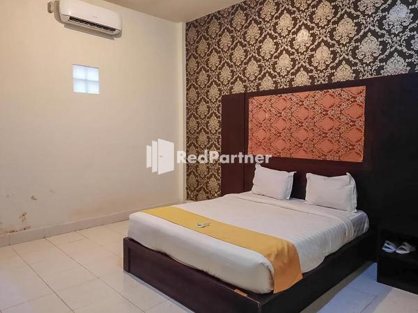 Hotel Puri Yasmin Potowanua Lasusua Mitra RedDoorz, Buchen Sie Hotel Günstige Hotels in Sulawesi