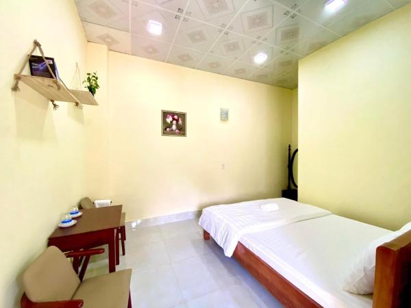 Homestay Hoàng Long, Prenota Affittacamere Hotel a Con Dao con parcheggio, Parcheggio