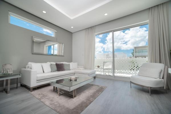 Luxury 1 bed apartment near Seven Mile Beach at The Grove - Villa Deluxe, Prenota Appartamento Hotel con piscina a Seven Mile Beach, Piscina