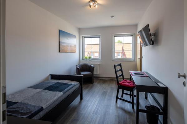 Gästehaus Olympia Wilhelmshaven - Moderne Einzelzimmer mit eigenem Bad für Monteure, Réserver Appartement Schortens Friesland
