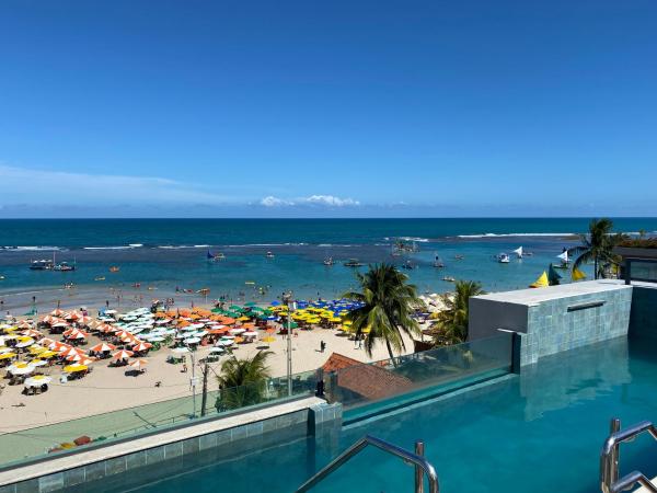 Flat à Beira Mar com Varanda em Frente as Piscinas Naturais, Reserva ahora Apartamento Hoteles en Noreste de Brasil con aparcamiento, Aparcamiento