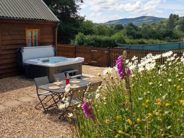 Seven Stars- hot tub & garden with fabulous views, Buchen Sie Ferienhaus Llandrindod Wells 