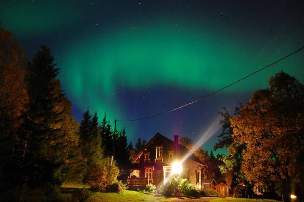 100 Years Old Norwegian Log House in Tromsø, Buchen Sie Ferienhaus Tromsø 