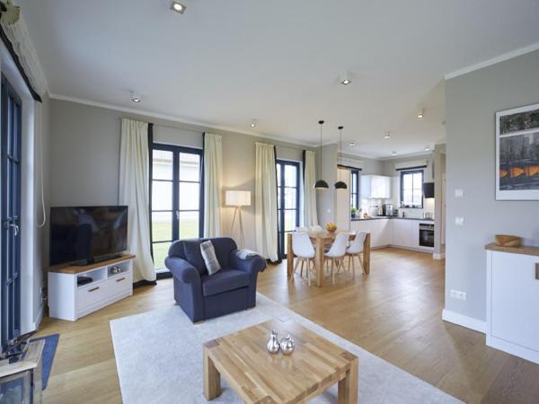 Reetland am Meer - Superior Reetdachvilla mit 2 Schlafzimmern F03, Réserver Maison de vacances Hôtels à Rügen avec piscine, Piscine