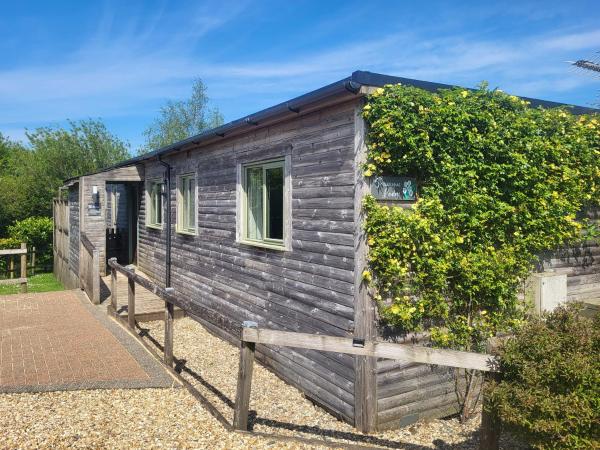 Primrose Lodge, Buchen Sie Ferienhaus Hotels in Devon mit Parkplatz, Parkplätze