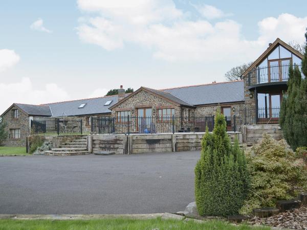 Ty Cerrig Farmhouse, Buchen Sie Ferienhaus  