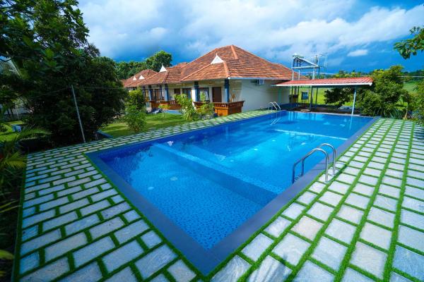 KOTTACKAL NATURE INN, Buchen Sie  Hotels mit Pool in Angamali, Schwimmbad