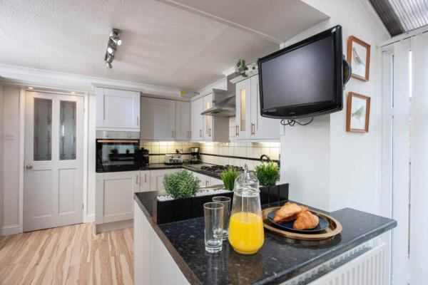 Rose Hill Retreat, Buchen Sie Ferienhaus  