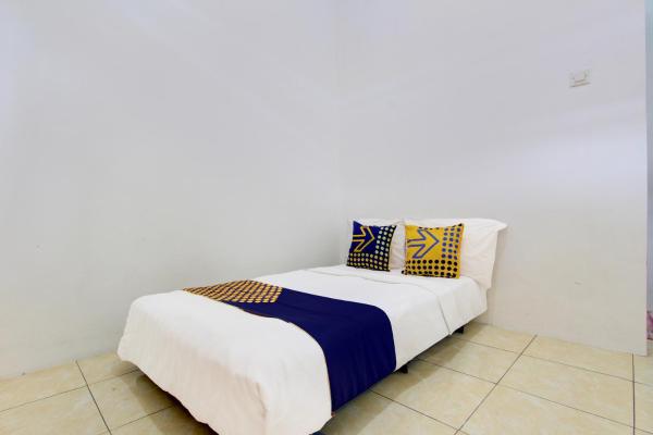 SPOT ON 93988 Guest House Wijaya Syariah Near alun alun kota purwokerto, Buchen Sie  Banyumas Central Java