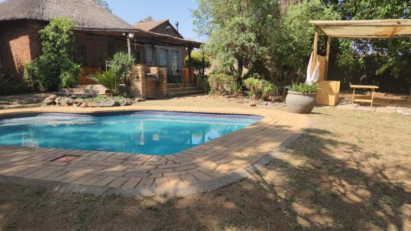 At the Well, Buchen Sie  Boksburg Gauteng