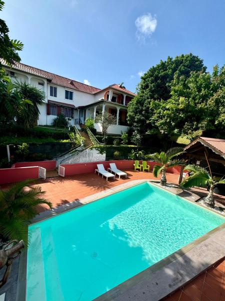 La Canopée Enchantée, chambres dhôtes, piscine, proche aéroport, Gare maritime, Buchen Sie  Les Abymes Grande-Terre