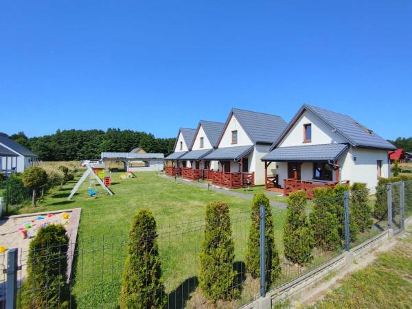 Domki Przy Morzu 550m do plaży, Reserva ahora  Rusinowo Pomerania Occidental
