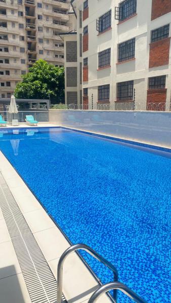 The executive cozy corner apartments with breathtaking city views ,rooftop chill spot area,heated swimming pool ,gym and modern lifestyle amenities, Buchen Sie Ferienwohnung Nairobi CBD Nairobi