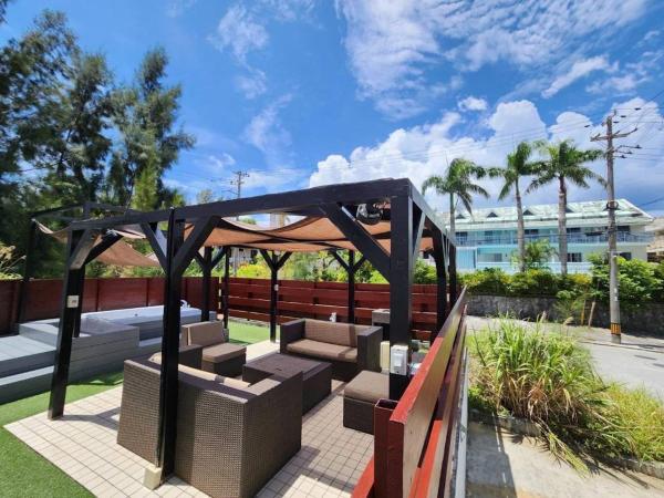 ビーチから徒歩6分広々としたテラスBBQ露天ジャグジーMorley2, Buchen Sie  Onna 