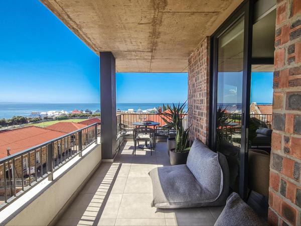 Salt & Sky Penthouse - Mossel Cove 304, Buchen Sie  Hotels in Mossel mit Pool, Schwimmbad