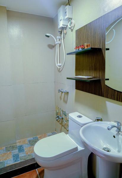 House of Citiflora Unit B, Prenota  Hotel a Luzon con parcheggio, Parcheggio