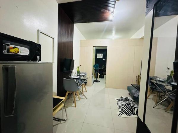 THEOS SUITE1 @TheGrassResidences, Buchen Sie  Hotels mit Pool in Luzon, Schwimmbad