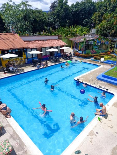 Hotel Palma Paraíso, Reserva ahora  Hoteles con piscina en Melgar, Piscina
