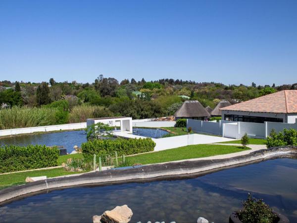 Louisville Guest Lodge, Buchen Sie Pension Hotels mit Pool in Gauteng, Schwimmbad
