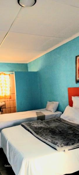 Platinum Palace Guest House, Buchen Sie  Hotels in Rustenburg mit Pool, Schwimmbad