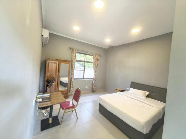 Best Cantonese urban stay, Buchen Sie  Hotels in Daressalam mit Parkplatz, Parkplätze