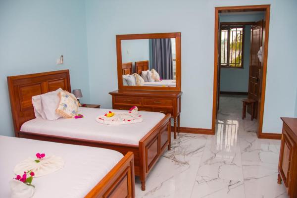 Zamu Beach Villa, Buchen Sie  Pwani Mchangani 