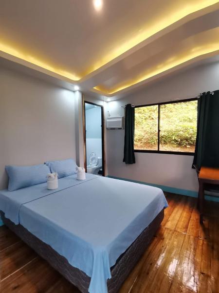 SandGrizz Tourist Inn, Buchen Sie  Hotels in Palawan mit Parkplatz, Parkplätze
