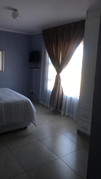 Dzuni Guesthouse, Buchen Sie  Johannesburg Gauteng