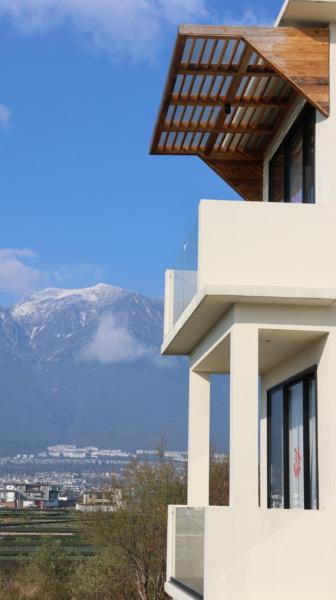 MuYeAnLin hotel, Prenota  Dali Yunnan