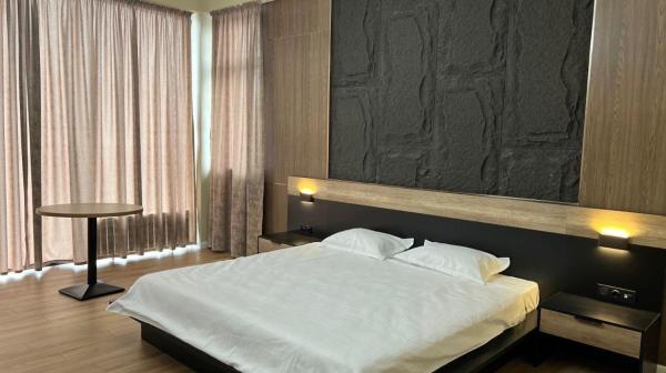 Van park hotel, Buchen Sie  Hotels in Schymkent mit Parkplatz, Parkplätze