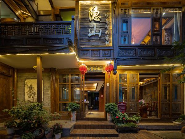 Hidden Mountain Boutique Scenic Inn, Buchen Sie  Lijiang Yunnan