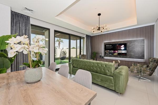 3BR Luxurious Villa pool view DAMAC Hills 2, Book  Dubai Dubai Emirate