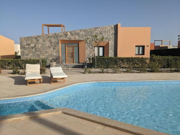 2BR Pool Front Soma bay Villa Near Mesca Beach, Prenota  Hotel a Mar Rosso con parcheggio, Parcheggio