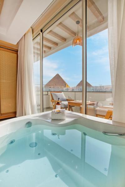 ONE GATE Pyramids View INN, Prenota  Hotel a Cairo Governorate con parcheggio, Parcheggio