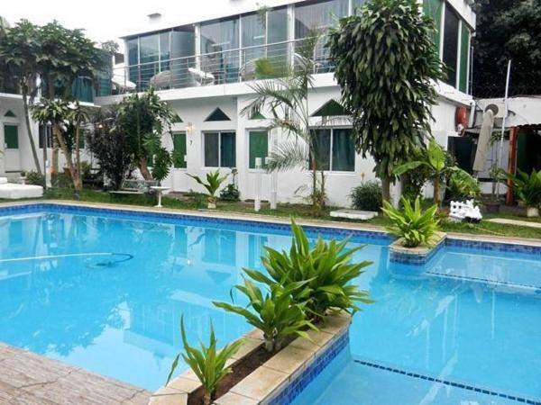 Villa das Mangas Garden Hotel, Buchen Sie  Hotels in Fombeni mit Parkplatz, Parkplätze