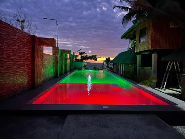 Beachfront Native house with pool, Prenota Hotel Hotel a Luzon con parcheggio, Parcheggio