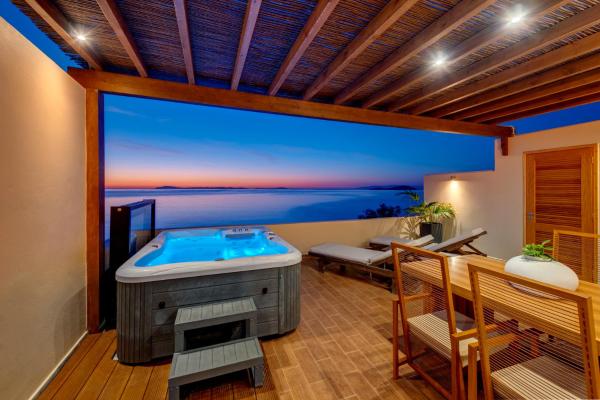 Lalari Beach Suites, Prenota  Hotel a Vari con parcheggio, Parcheggio