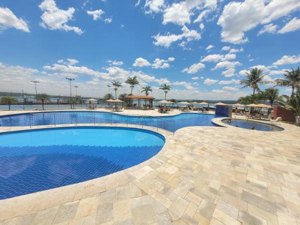FLATS NO LAKE SIDE, A BEIRA DO LAGO PARANOÁ, COM ACESSO AO LAGO, LOCALIZADO NO SHTN TRECHO 1, COM PISCINA AQUECIDA, ACADEMIA, SAUNA, QUADRAS ESPORTIVAS, RESTAURANTE, LANCHONETE, FARMÁCIA, VAGA DE GARAGEM, RECEPÇÃO 24HS, WI-FI, SMART TV By REI DOS FLATS, Reserva ahora  Hoteles con piscina en Distrito Federal, Piscina