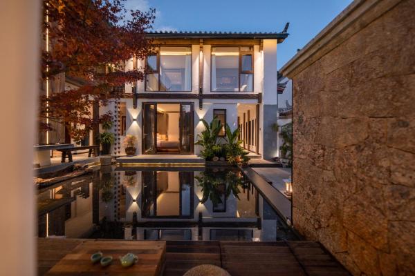 丽江梦乡居客栈, Buchen Sie Hotel Lijiang Yunnan