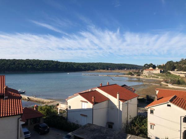 Apartments Palit Rab, Buchen Sie Ferienwohnung Hotels in Insel Rab mit Parkplatz, Parkplätze