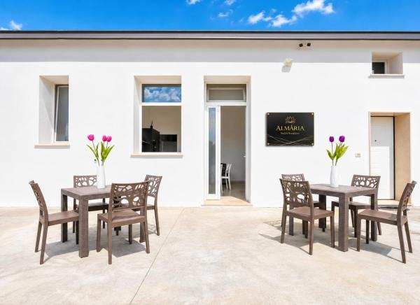 Almària - Rooms e Garden, Buchen Sie  Hotels in Nardò mit Parkplatz, Parkplätze