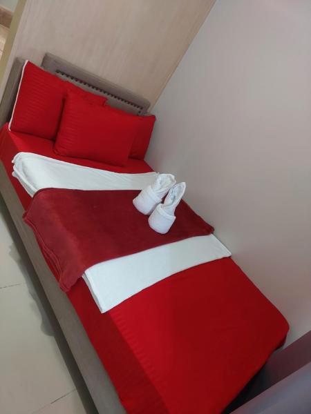 Airah sea staycation, Prenota  Hotel a Luzon con parcheggio, Parcheggio