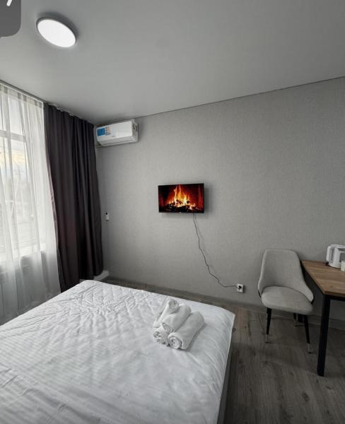 Izi hotel, Buchen Sie  Zhezdi Karaghandy