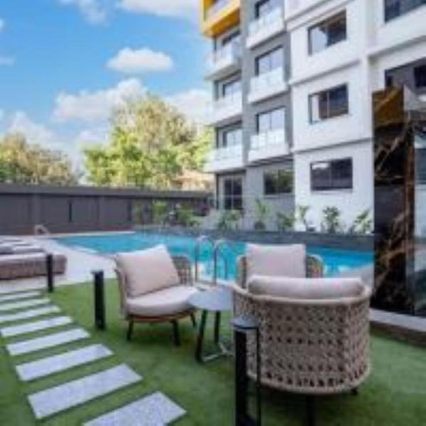 Spacious executive three bedroom apartment with amazing facilities,high speed wifi,swimming pool,fully equipped gym and close proimity to major shopping malls and restaurants and designated child play area, Buchen Sie Ferienwohnung Nairobi CBD Nairobi