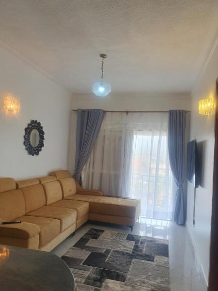 Two Bedrooms Apartment, located between kajjansi and kitende, with one bathroom, a living room, fully furnished kitchen, patio, free wifi, free parking space, Prenota Appartamento Appartamenti a Busiiro, Appartamento