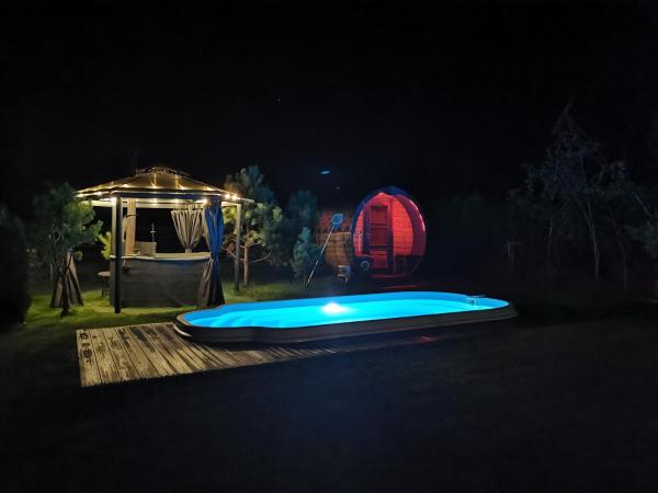 Całoroczny dom na Mazurach WrzoSPA z jacuzzi, Réserver Maison de vacances  
