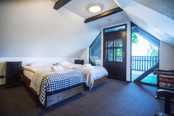 Gospoda pod Czarnym Łabędziem, Réserver Chambre d'hôtes Rydzewo Warmia-Masuria.